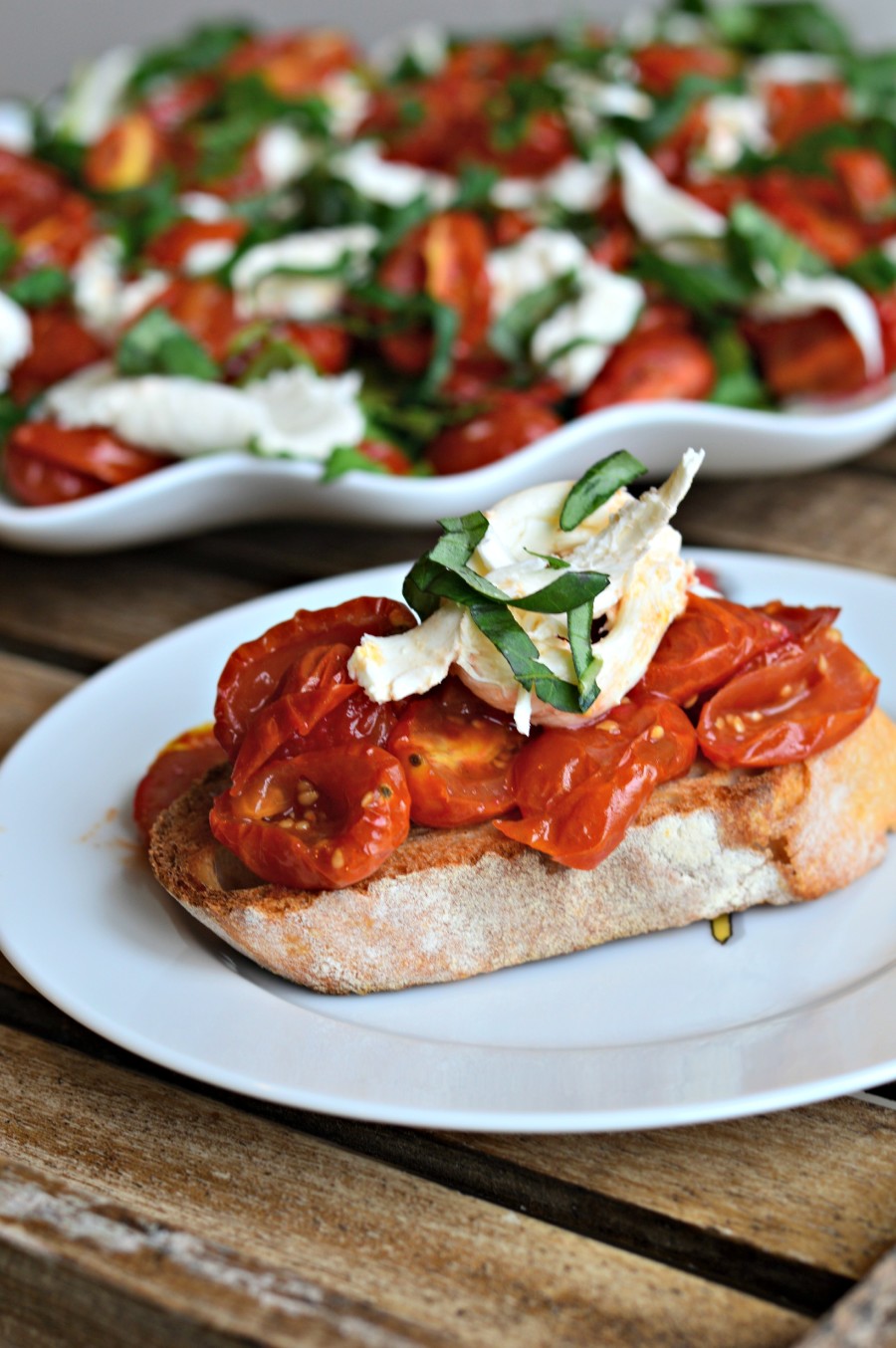 Arugula With Slow Roasted Cherry Tomatoes And Burrata West Of The Loop